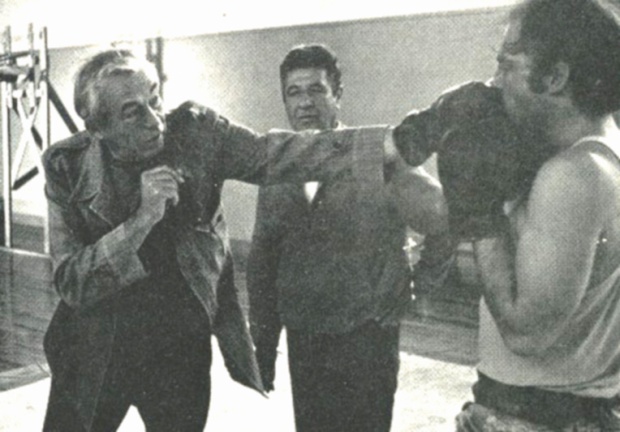 John Huston demonstrates boxing technique while directing the 1972 feature film, Fat City.